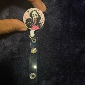 Scream mask badge holder